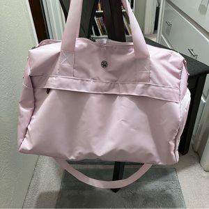 Super cute baby pink Gaiam gym bag with yoga mat straps
